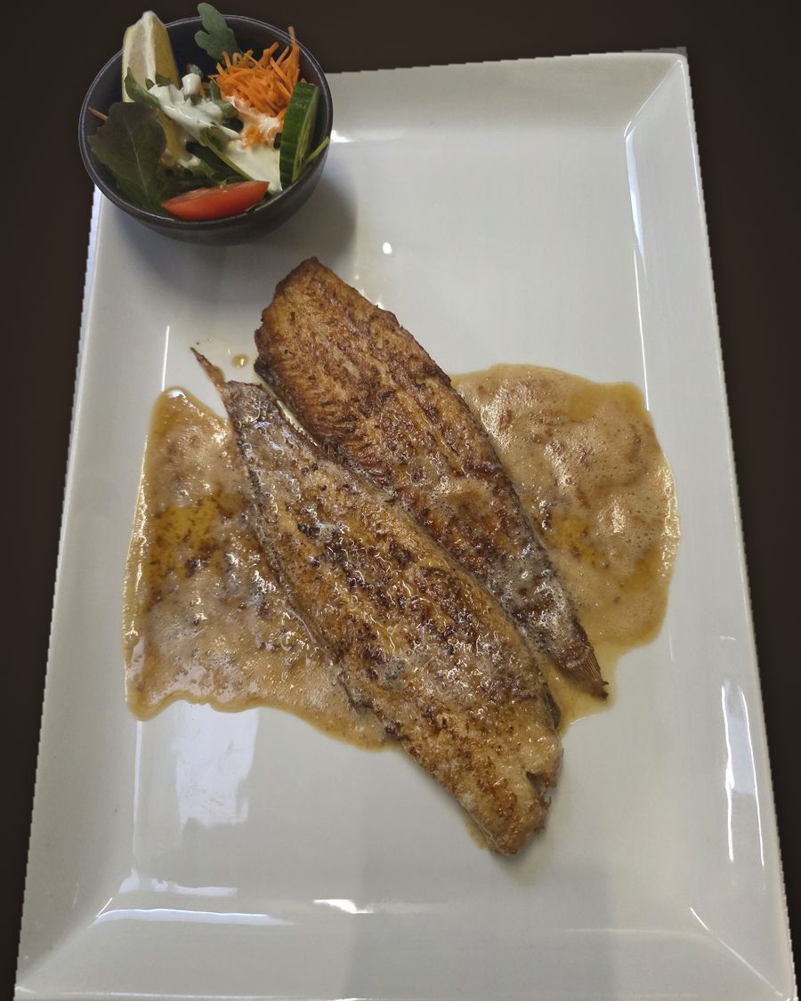 Pan-fried fish fillets with butter sauce